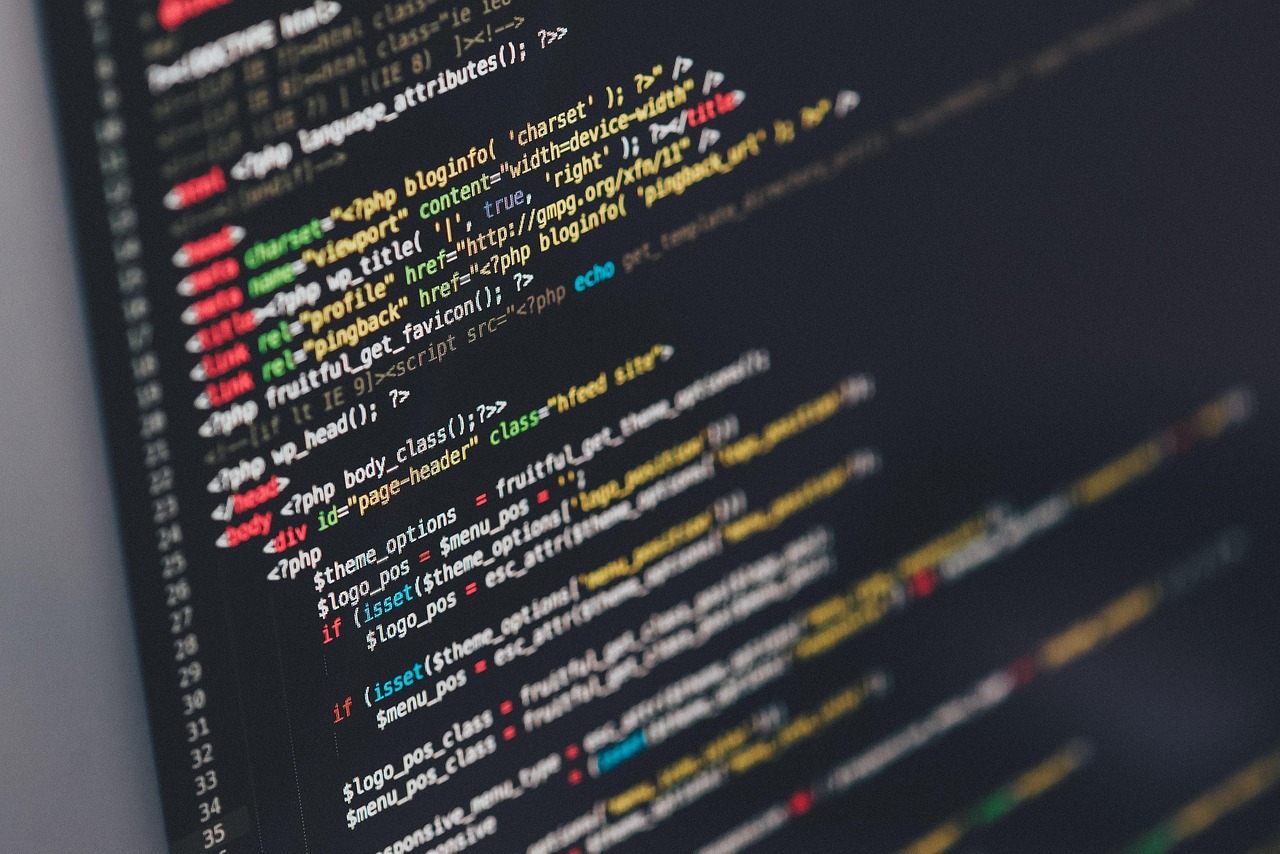 Developer comparing AI coding assistants on a laptop