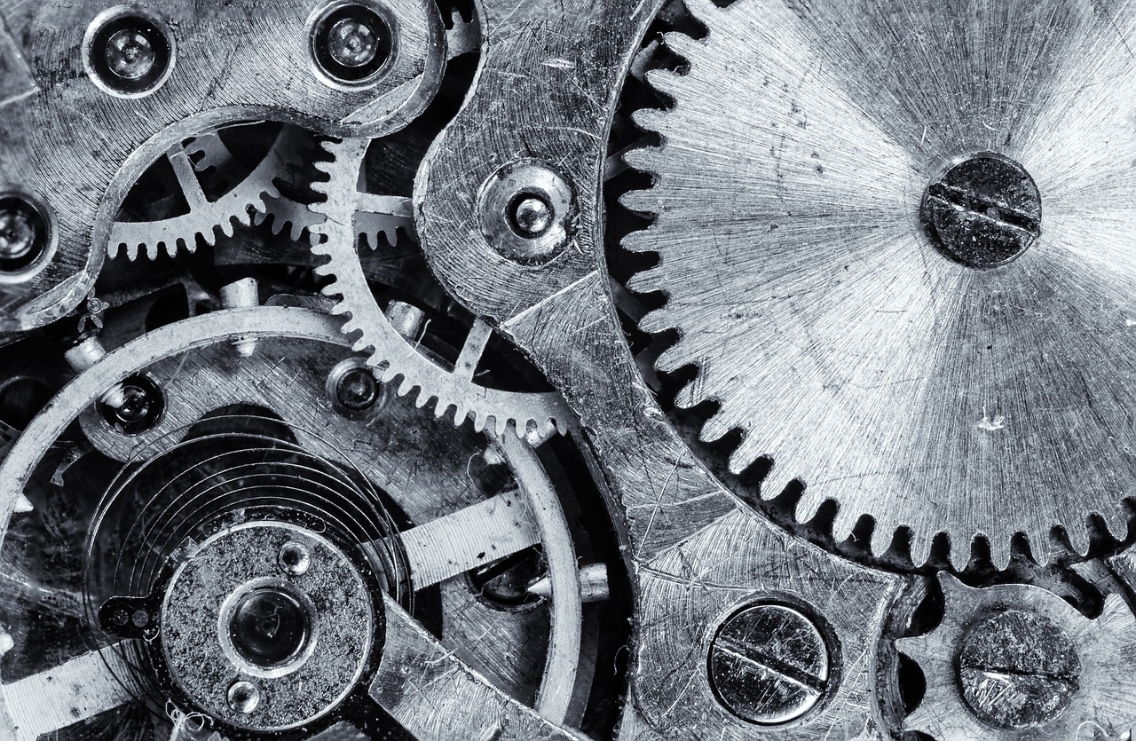 Interlocking gears representing functional mechanisms