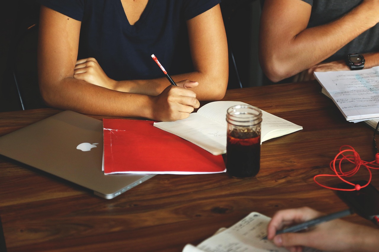 A strategic plan being sketched out in a notebook
