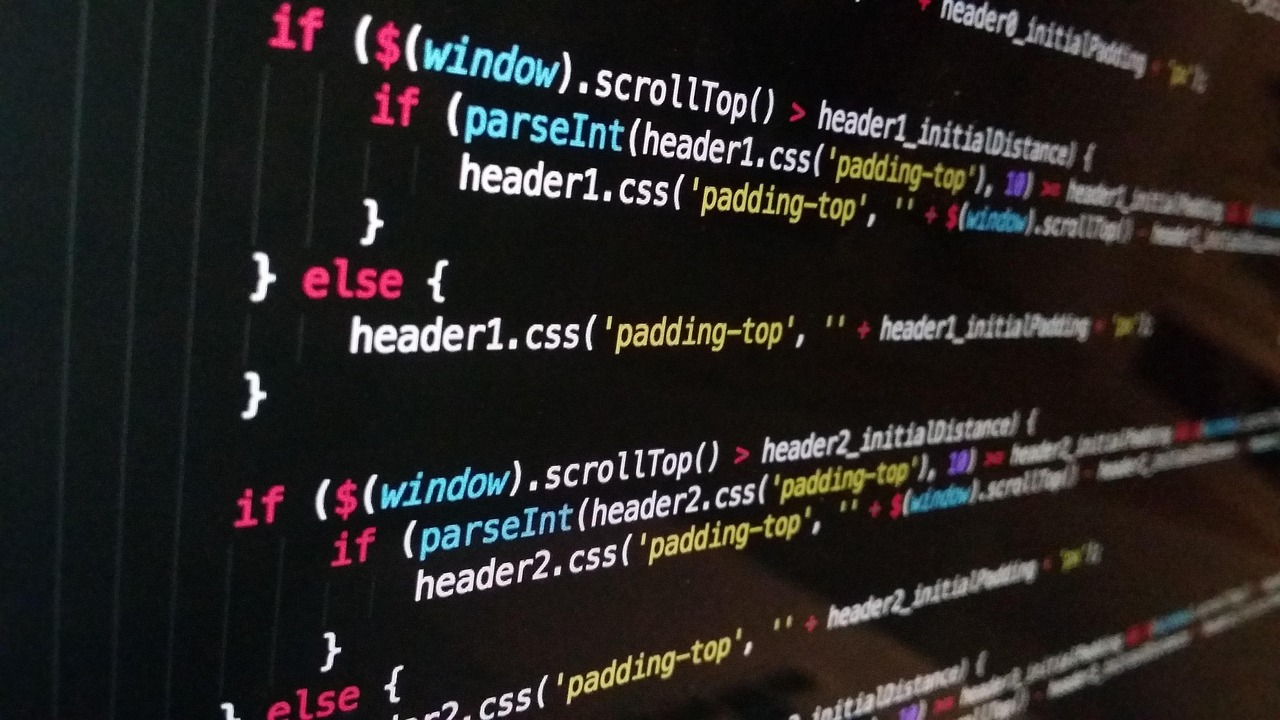 Code editor open next to a web browser window