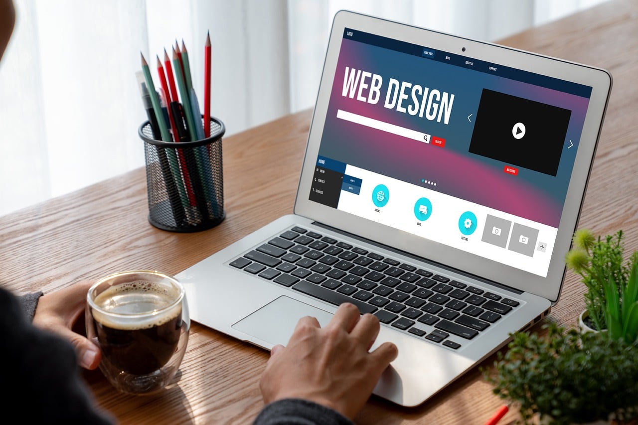 Several web design screens showing user interface layouts